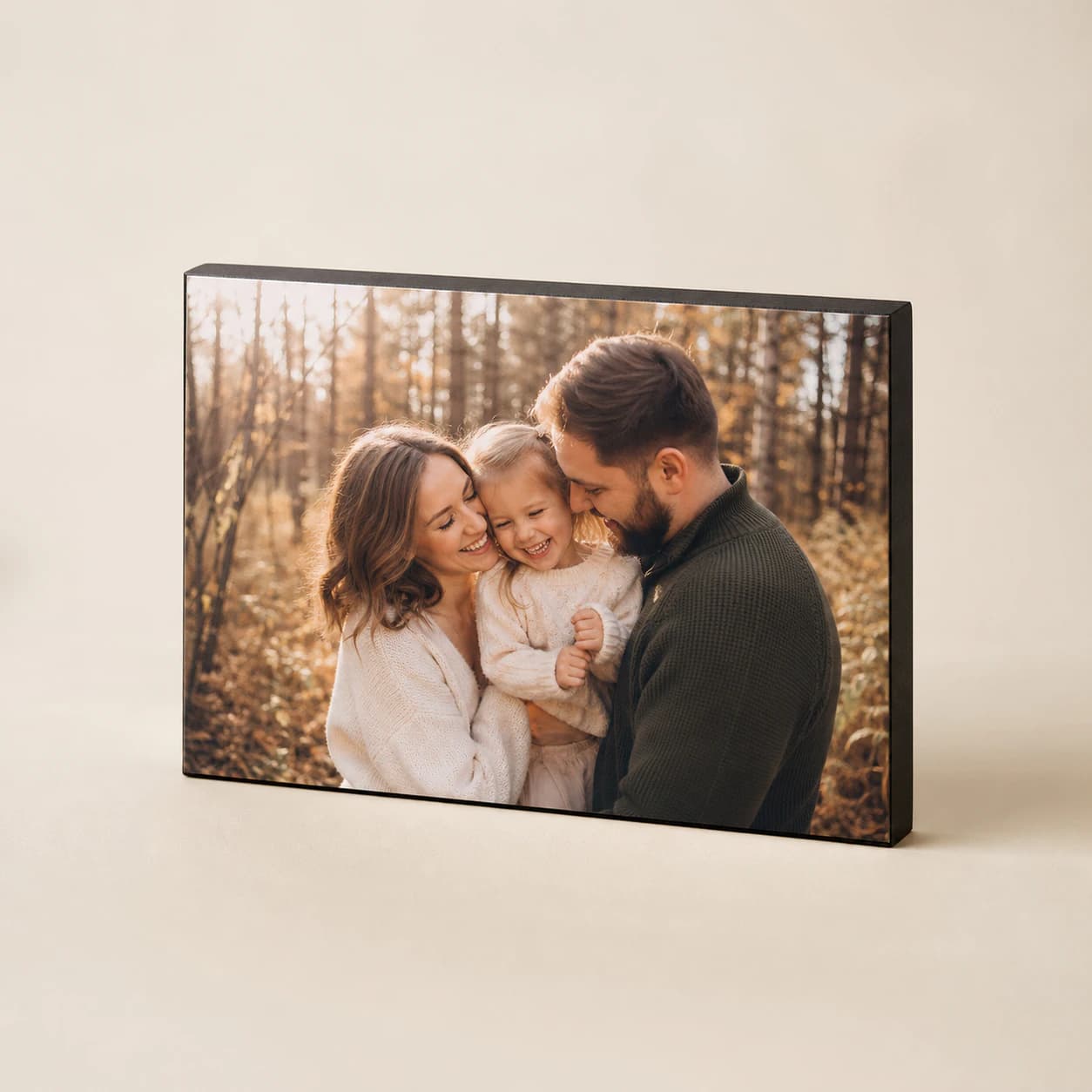 Freestanding personalised wooden photo block in a studio setting